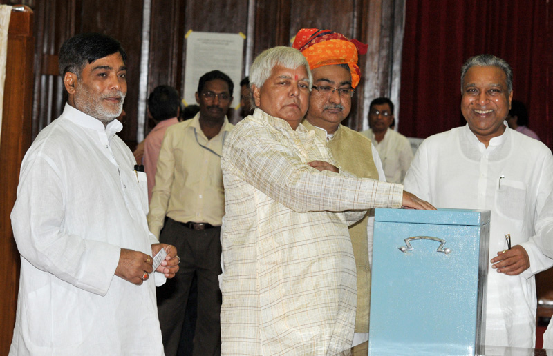 The Member of Parliament, Shri Lalu Prasad casting his vote in...