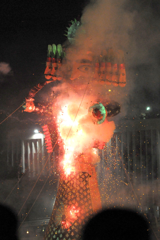 The Ravana effigy in flames, at the Dussehra celebrations, at Ramleela Maidan..