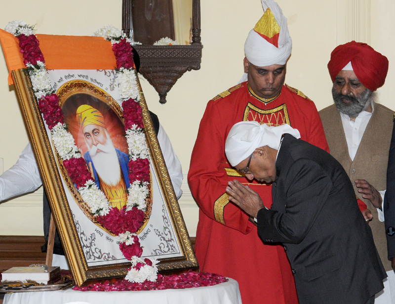 The President, Shri Pranab Mukherjee paying homage at the portrait of...