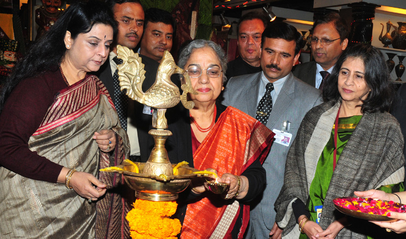 Smt. Gursharan Kaur, Wife of the Prime Minister of India lighting the lamp...