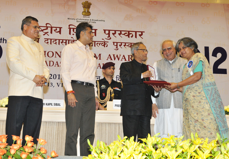 The President, Shri Pranab Mukherjee presenting the Rajat Kamal Award for Best Editing...