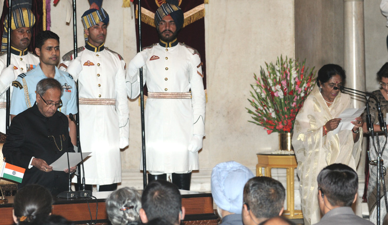 The President, Shri Pranab Mukherjee administering the oath as Minister of State to...
