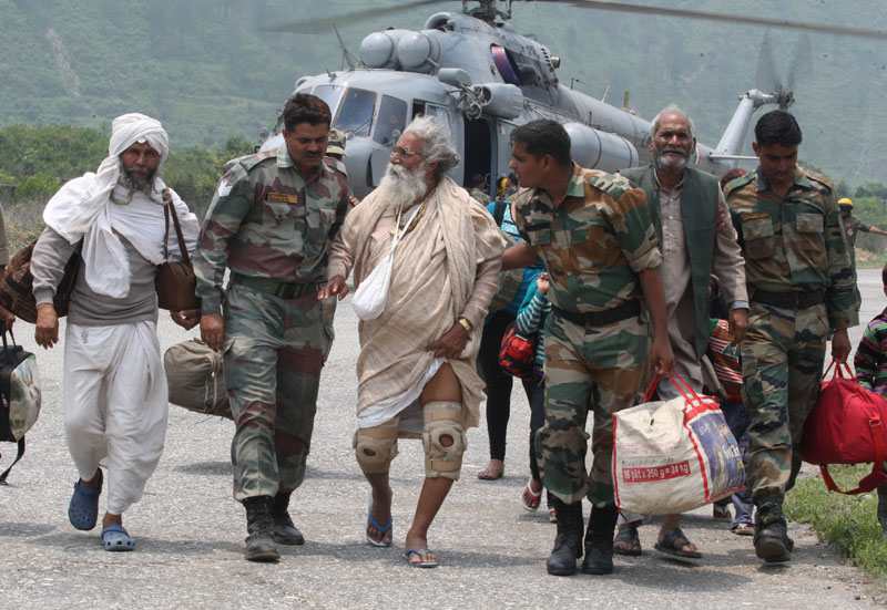 Pilgrims rescued from Harsil arrive at Dharasu, Uttarakhand.