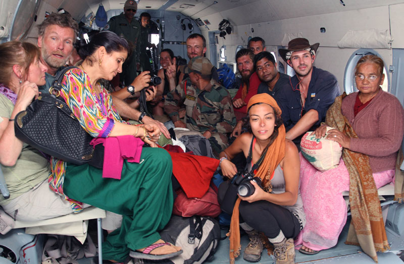 Rescued pilgrims and tourist from Harsil sitting in an IAF helicopter, during their relief & rescue..