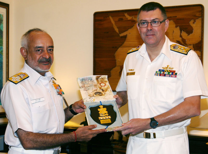 The Chief of Navy, Royal Australian Navy, Vice Admiral RJ Griggs meeting the...
