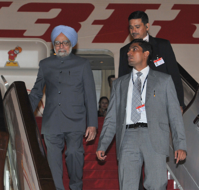 The Prime Minister, Dr. Manmohan Singh arrives at the Beijing International Airport,...