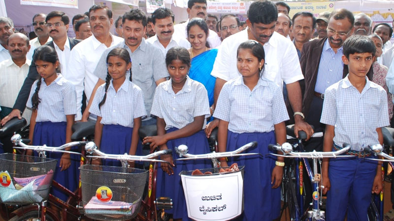 The MP, Shri D.K Suresh distributed cycles to the students, at the Public Information on ...