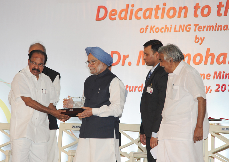 The Prime Minister, Dr. Manmohan Singh being presented a memento by...