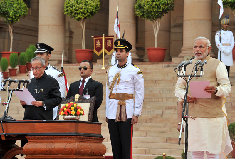 The President, Shri Pranab Mukherjee administering the oath of office of...