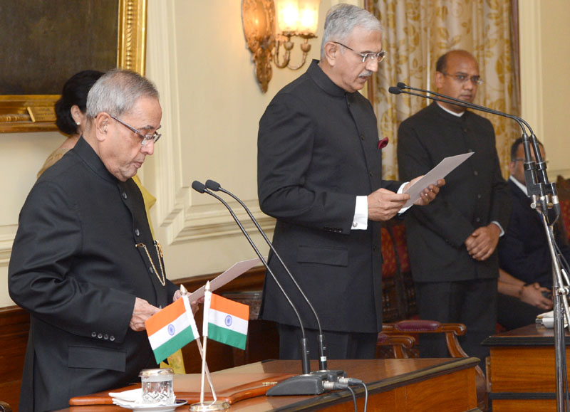 The President, Shri Pranab Mukherjee administering the oath to...
