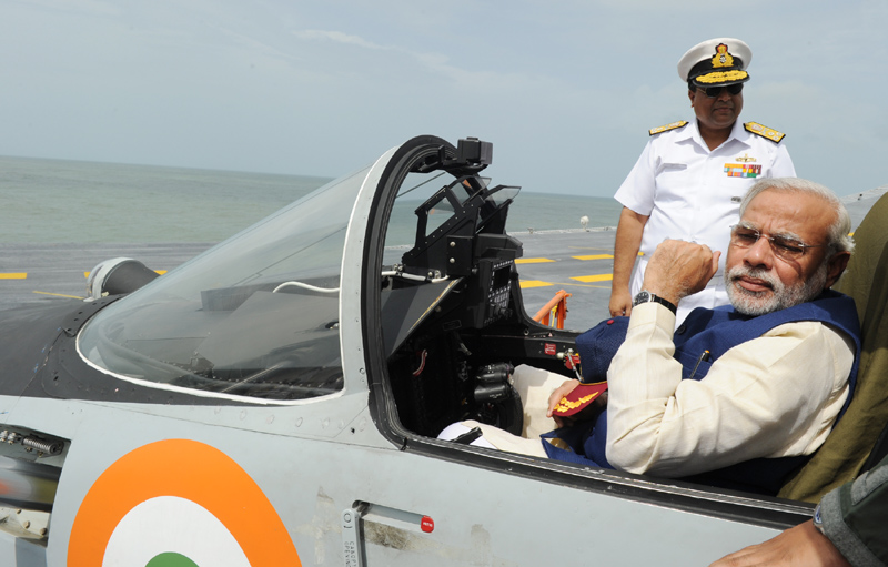 The Prime Minister, Shri Narendra Modi at an aircraft onboard INS Vikramaditya, in Goa