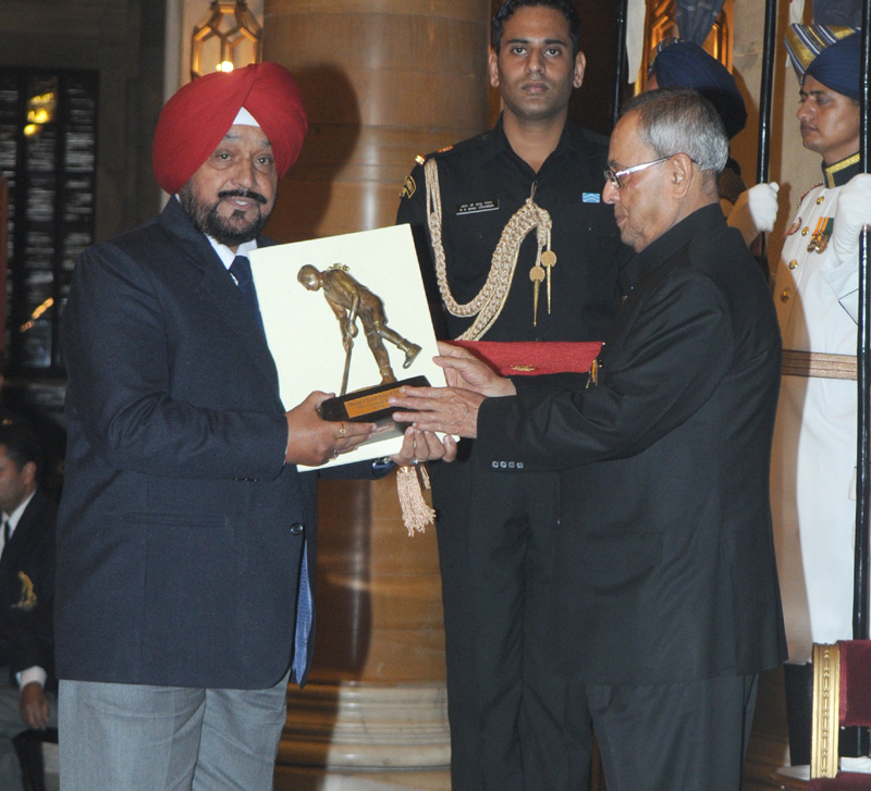 The President, Shri Pranab Mukherjee presenting the Dhyan Chand Award for...