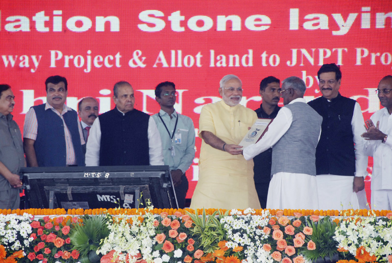 The Prime Minister, Shri Narendra Modi handed over land allotment letters to...