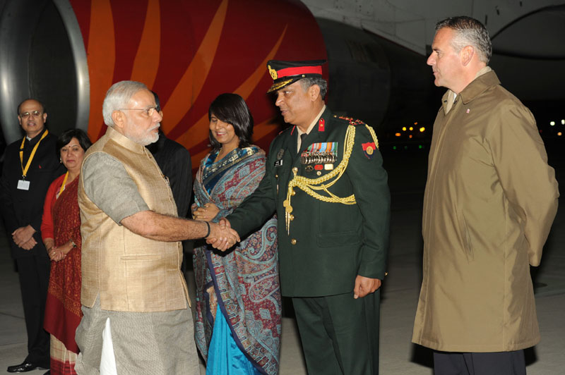 The Prime Minister, Shri Narendra Modi being received on his arrival, at the ...