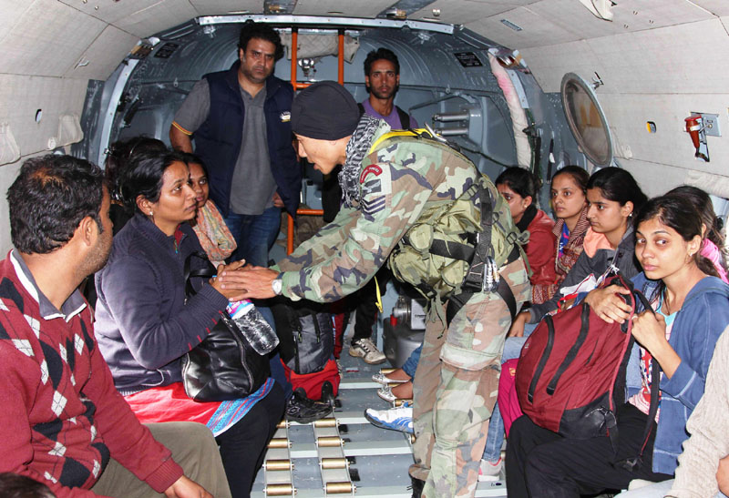 Garud commando onboard consoling one of the rescued persons during flood in Srinagar