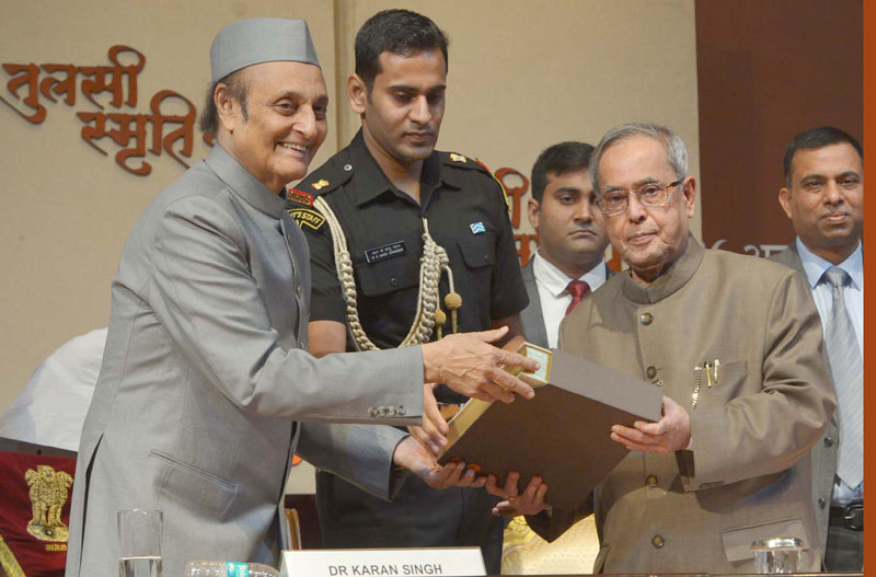 The President, Shri Pranab Mukherjee receiving the first copy of “Tulsi Smriti...