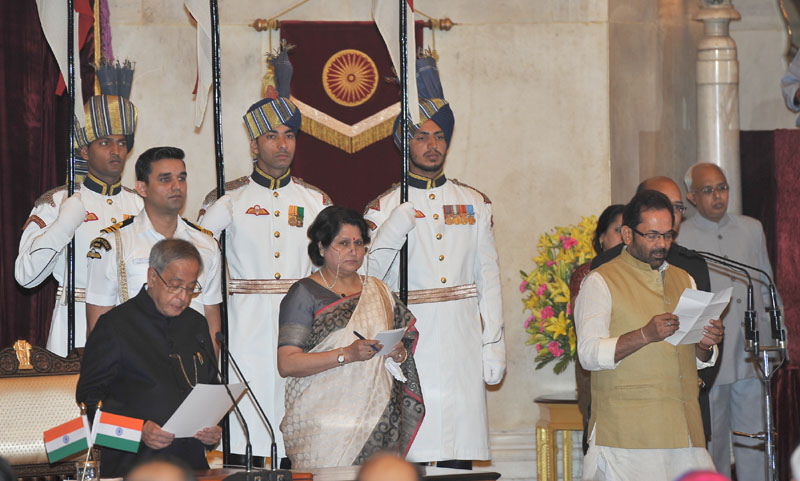 The President, Shri Pranab Mukherjee administering the oath as Minister of ...
