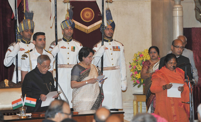 The President, Shri Pranab Mukherjee administering the oath as Minister of State to..