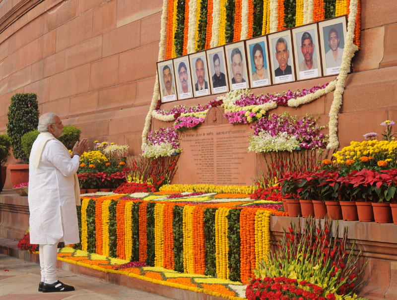 The Prime Minister, Shri Narendra Modi paying homage to the martyrs of the...