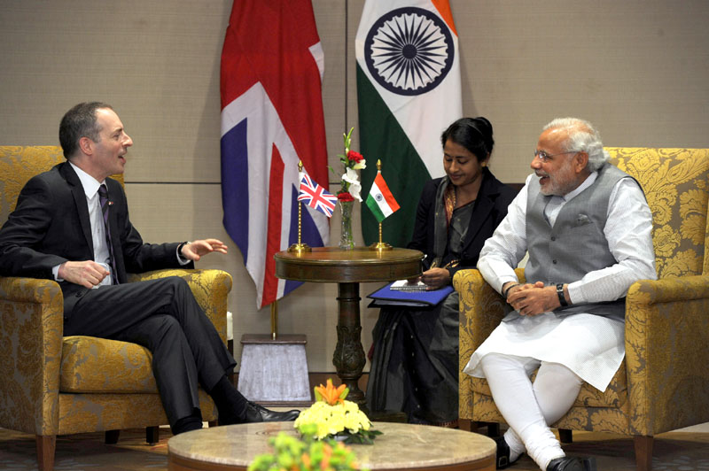The Prime Minister, Shri Narendra Modi meeting the Minister of State for Trade & Investment ..