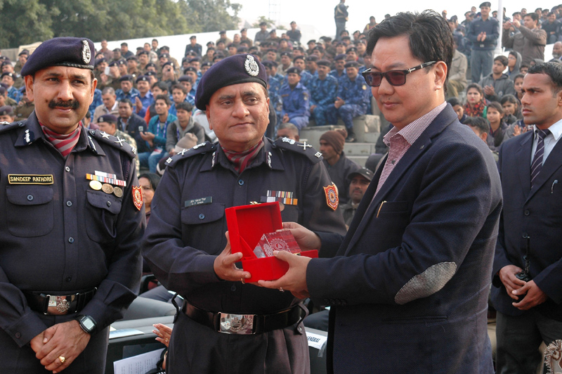 The Minister of State for Home Affairs, Shri Kiren Rijiju being presented a..