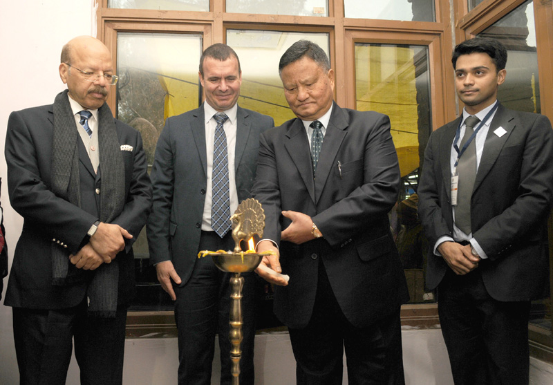 The Chief Election Commissioner, Shri H.S. Bramha lighting the lamp to ..
