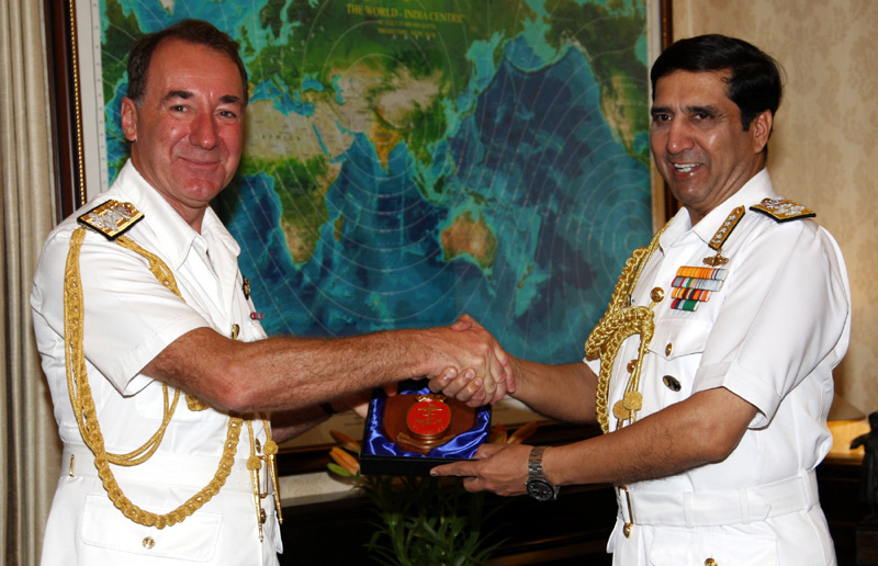The Chief of Naval Staff, Admiral R.K. Dhowan exchanging memento with the First Sea Lord and..
