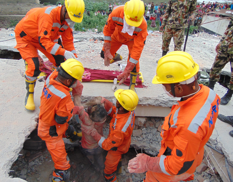 The NDRF personnel engaged in Search and Rescue Operations in the earthquake hit Nepal
