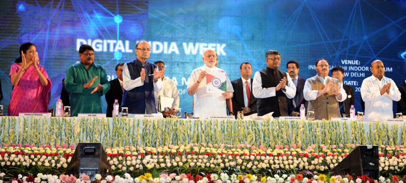 The Prime Minister, Shri Narendra Modi releasing the ‘Digital India Book’, at the ..