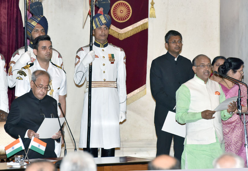 The President, Shri Pranab Mukherjee administering the oath as Minister of State to ..