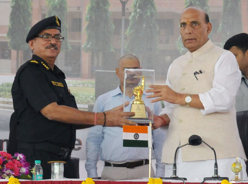 The Union Home Minister, Shri Rajnath Singh being presented a memento ..